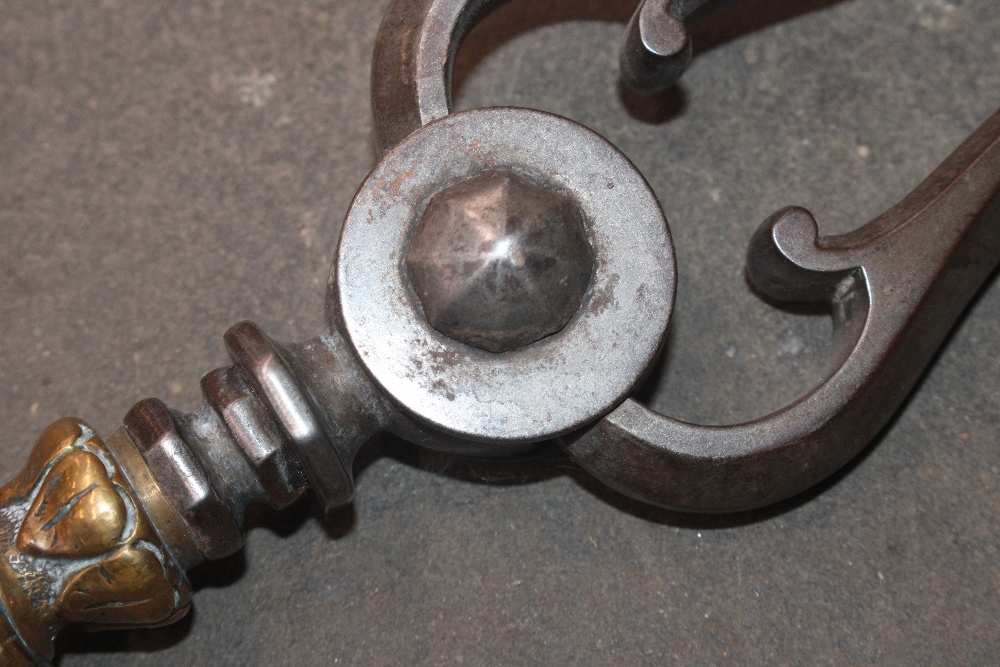 A Victorian brass fender, 139cm wide; a set of three steel and brass fire implements; a pair of - Image 4 of 4