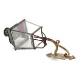 A Victorian copper clear and coloured glass panelled street lamp, on iron bracket, 134cm overall