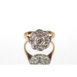 A Victorian diamond daisy shaped cluster ring, 18ct gold, 3.4gms, ring size L