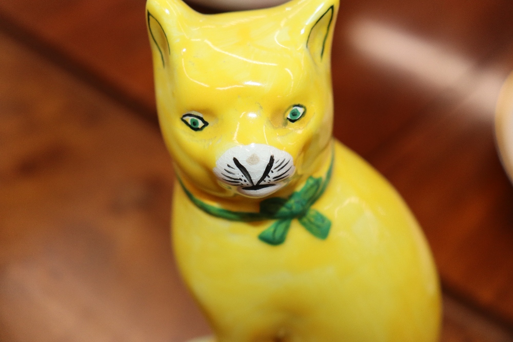 A pair of Staffordshire yellow glazed figures of seated cats on cushions, 20cm high - Image 16 of 18