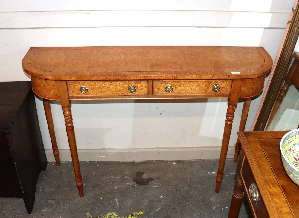 A birch D end hall table, fitted two central drawers raised on turned tapering supports, 119cm