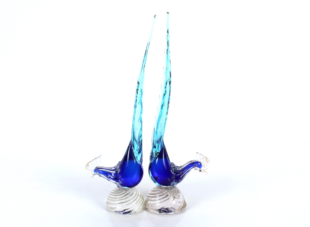 A pair of Murano type blue tinted glass exotic birds, 44cm high overall