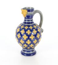 A Minton Majolica Bellarmine type jug, circa 1867, 29cm high