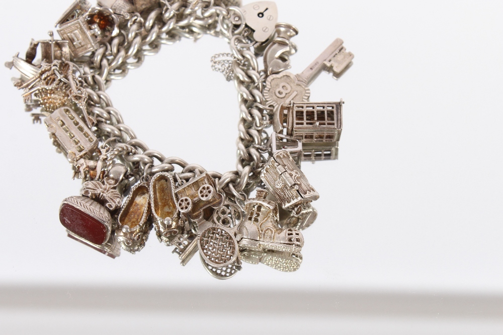 A very large silver charm bracelet, set many charms, 111gms - Image 4 of 5