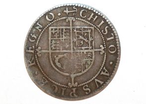 A Charles I sixpence, MM anchor and mullet