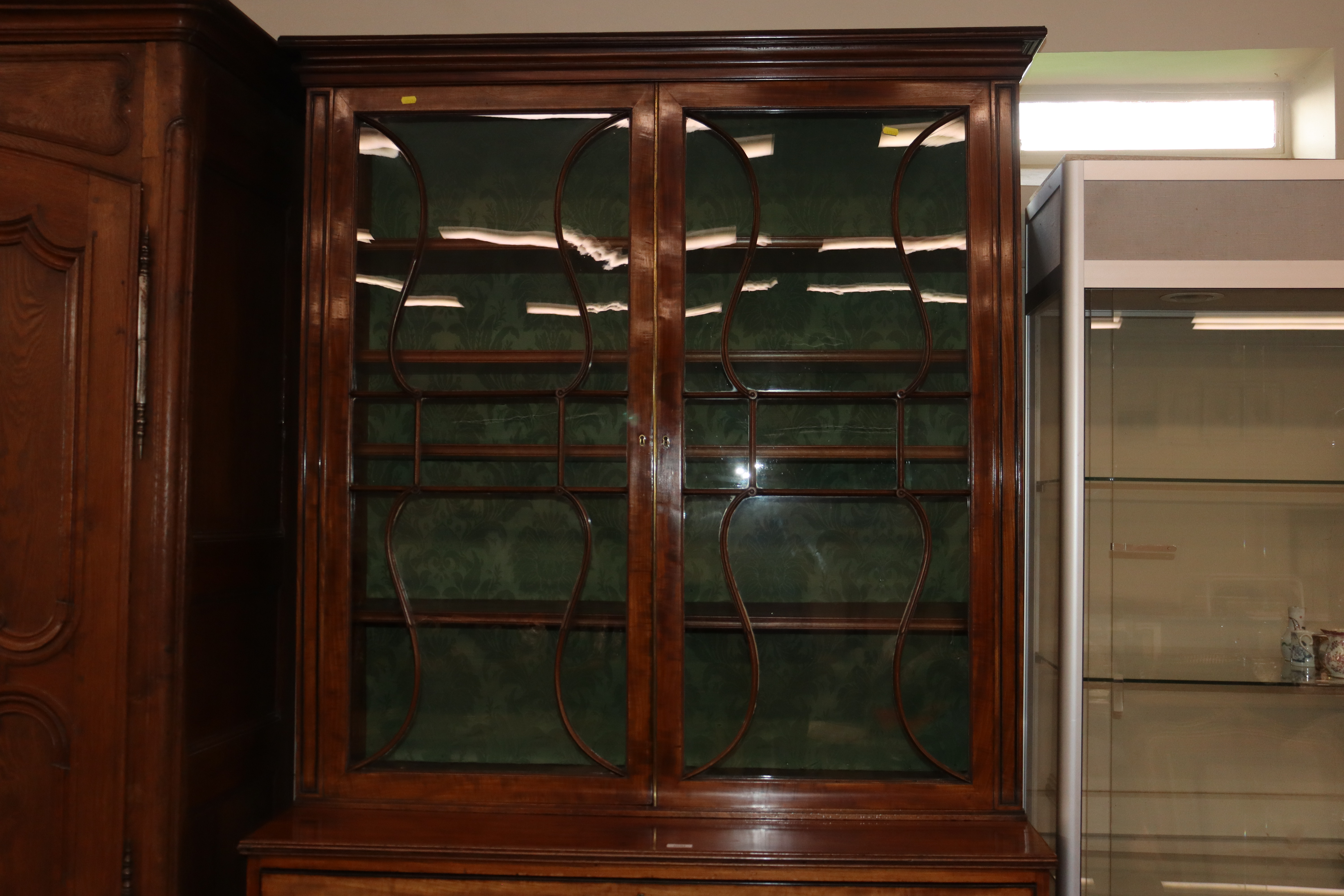 An early 19th Century mahogany secretaire bookcase, the upper adjustable shelves enclosed by a - Image 3 of 3