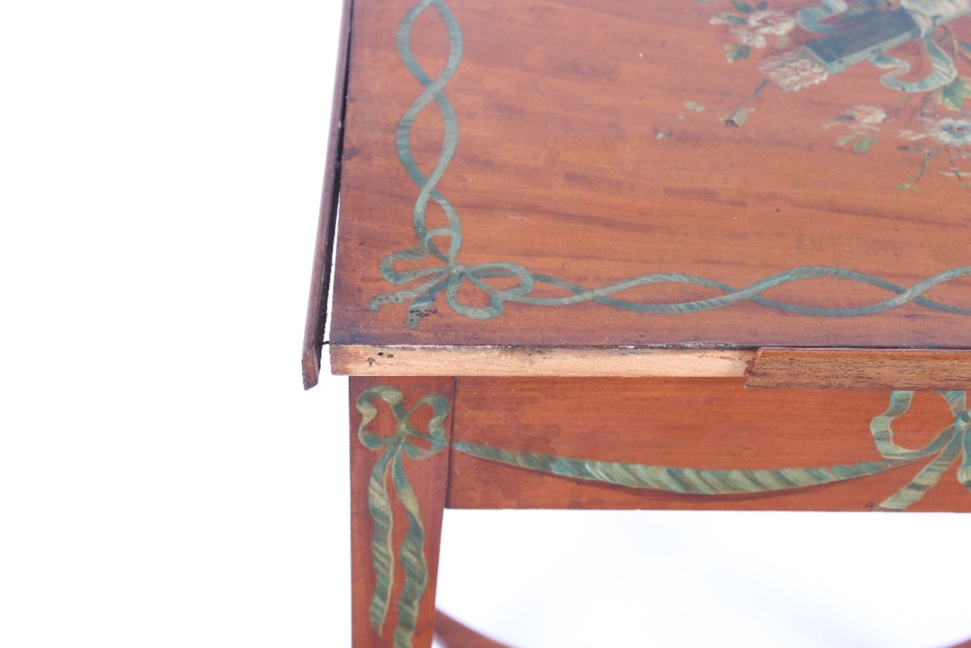 A late 19th Century painted satinwood two tier occasional table, decorated trailing ribbons and - Image 3 of 5