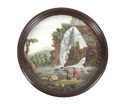 A miniature circular micro mosaic picture depicting figures in front of a waterfall; and a pair of