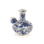 A Chinese Ming style Kendi of traditional form, blue glazed floral and bird decoration, 18cm high