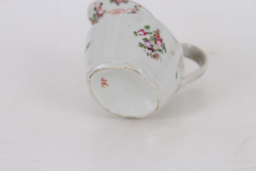A Newhall porcelain cream jug, of fluted form, floral spray decoration marked N173 to base; and a - Image 6 of 6