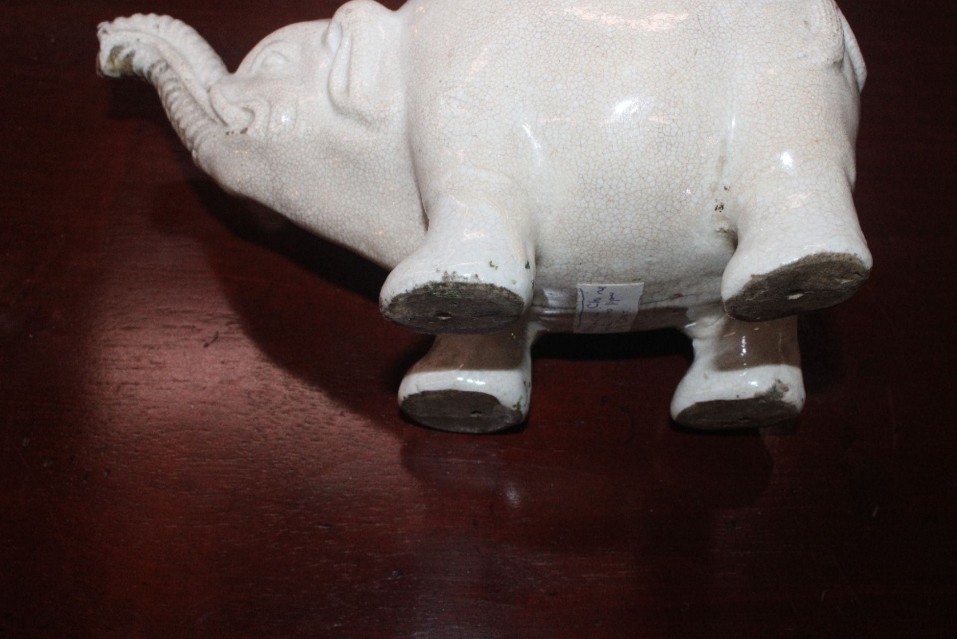 A Chinese blanc de chine water dropper in the form of an elephant, having moulded decoration to - Image 20 of 21