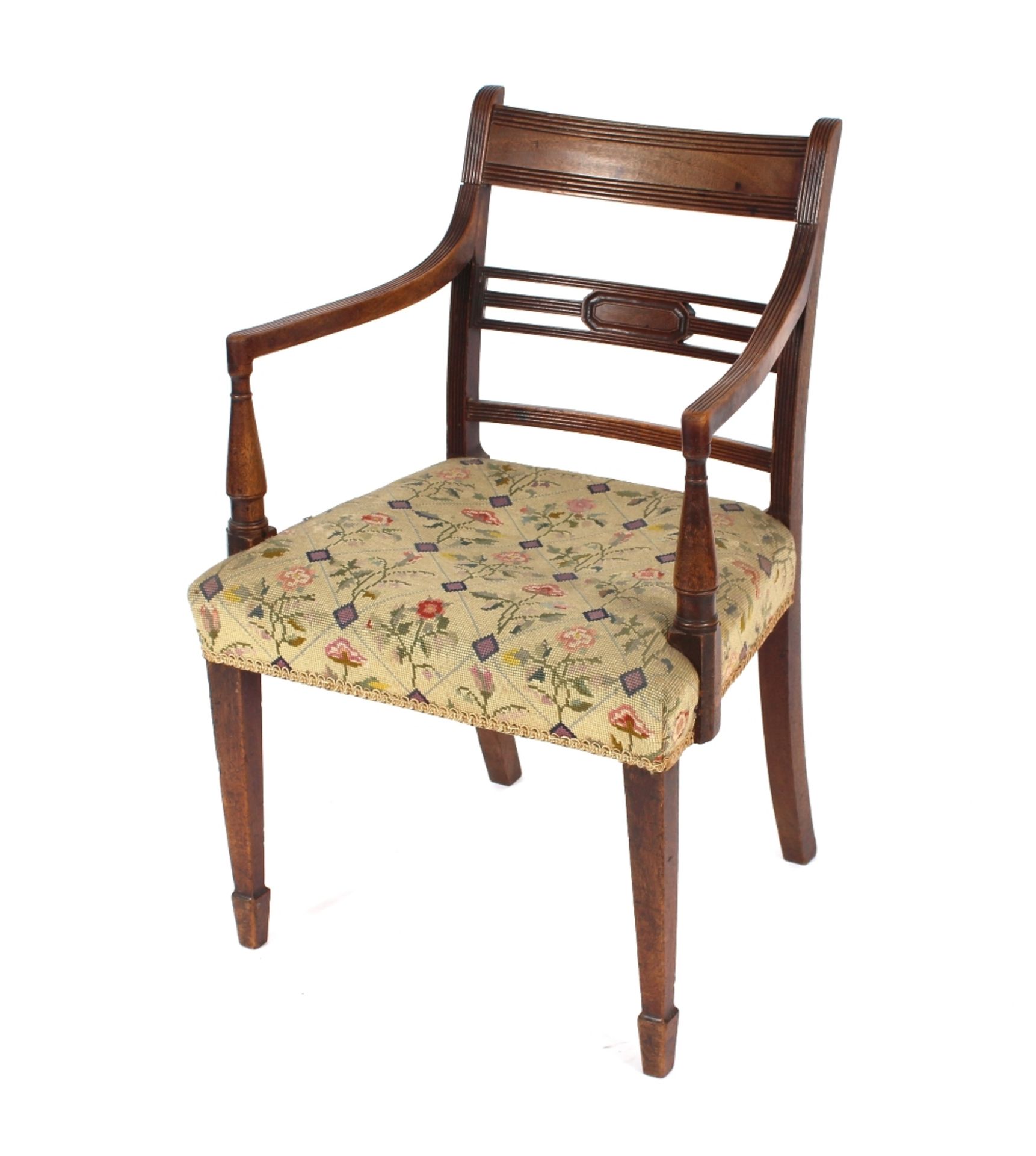 A 19th Century mahogany rail bac k elbow chair with tapestry seat