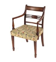 A 19th Century mahogany rail bac k elbow chair with tapestry seat