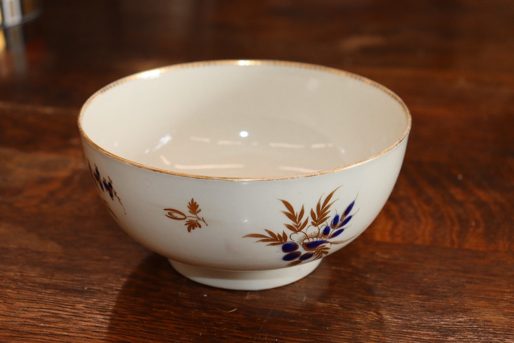 A 19th Century English porcelain part tea set having blue floral decoration heightened in gilt, - Image 9 of 33