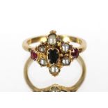 A Victorian coloured gem stone and seed pearl set cluster ring, 3.5gms. Size M