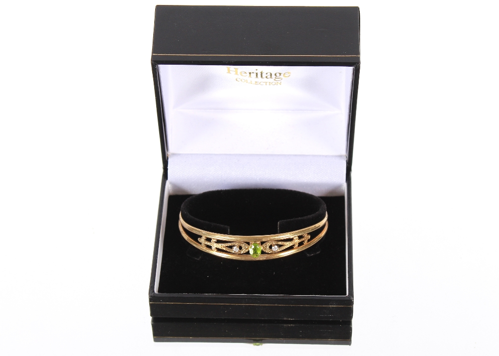 A 9ct gold peridot and white stone bangle, 10.7gms - Image 2 of 6