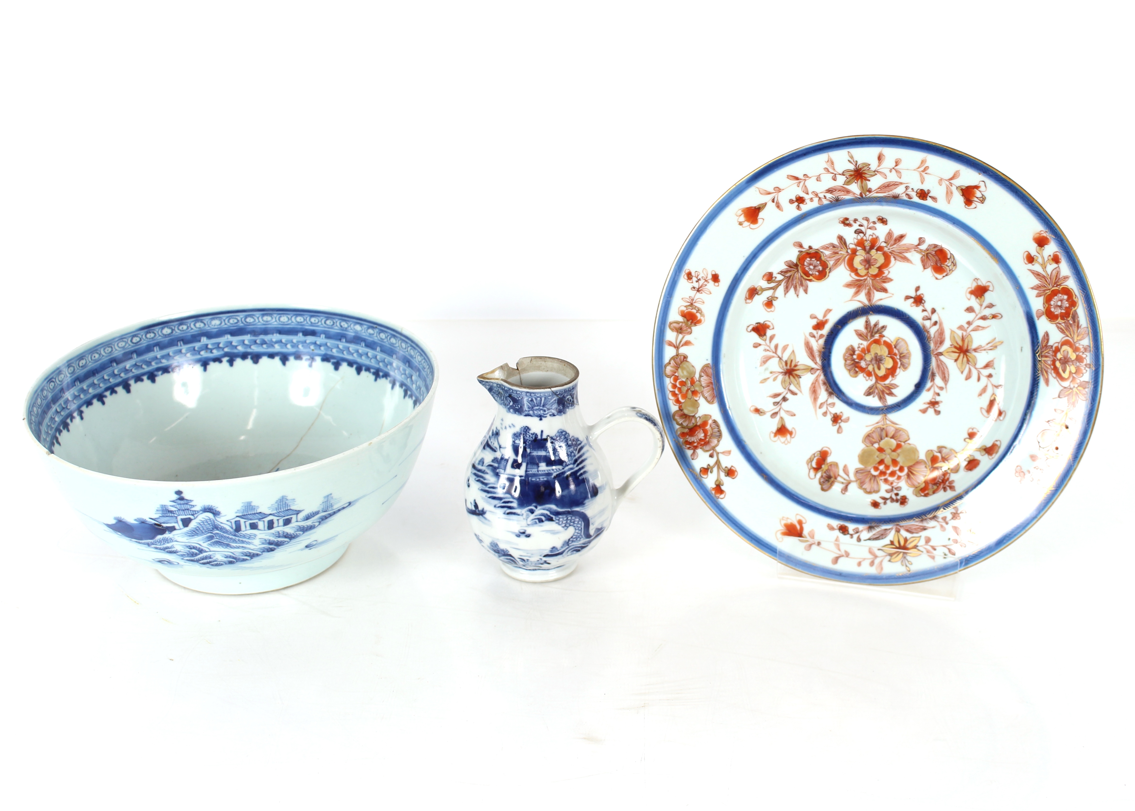 A Chinese Imari pattern shallow dish, 25cm dia.; a Chinese blue and white bowl decorated pagodas and