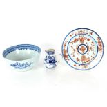 A Chinese Imari pattern shallow dish, 25cm dia.; a Chinese blue and white bowl decorated pagodas and