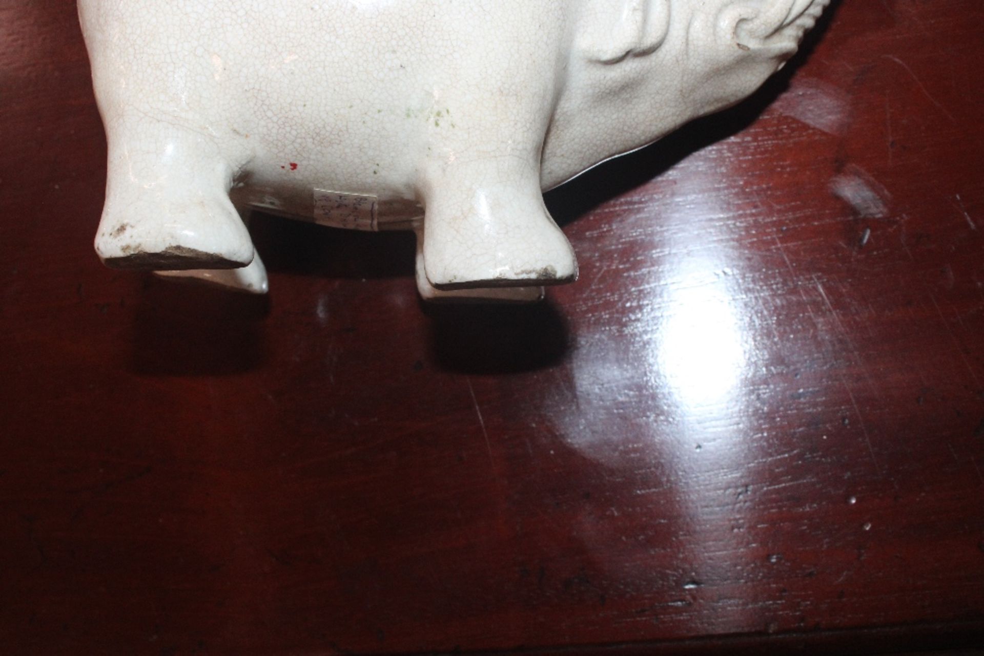 A Chinese blanc de chine water dropper in the form of an elephant, having moulded decoration to - Image 21 of 21