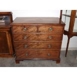 A 19th Century mahogany chest fitted two short and three long graduated drawers, raised on bracket