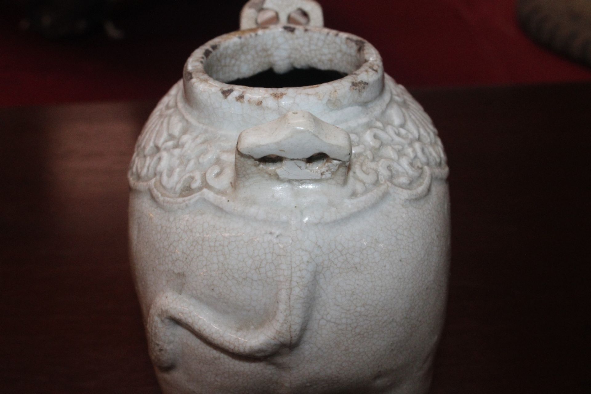 A Chinese blanc de chine water dropper in the form of an elephant, having moulded decoration to - Image 13 of 21