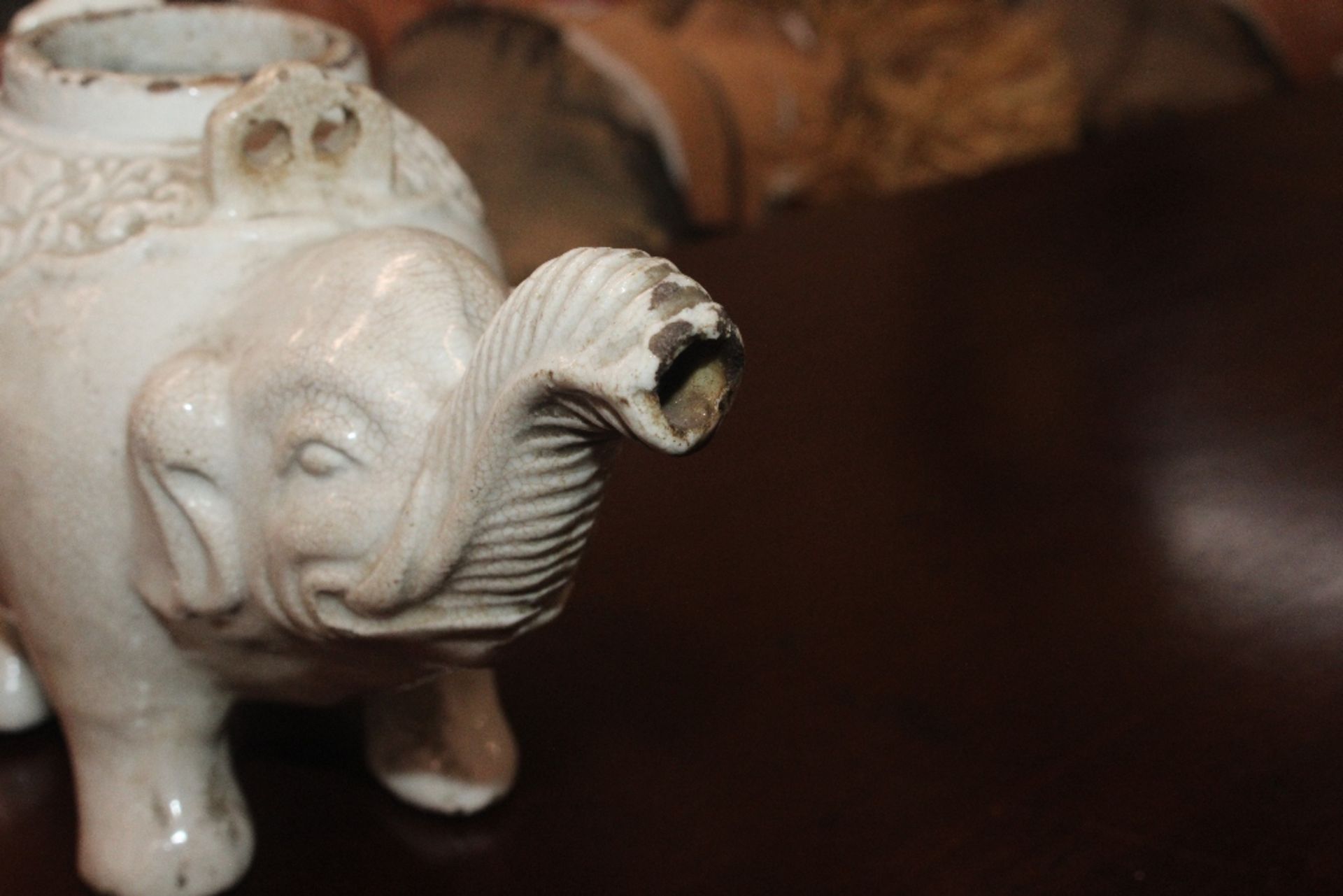 A Chinese blanc de chine water dropper in the form of an elephant, having moulded decoration to - Image 5 of 21