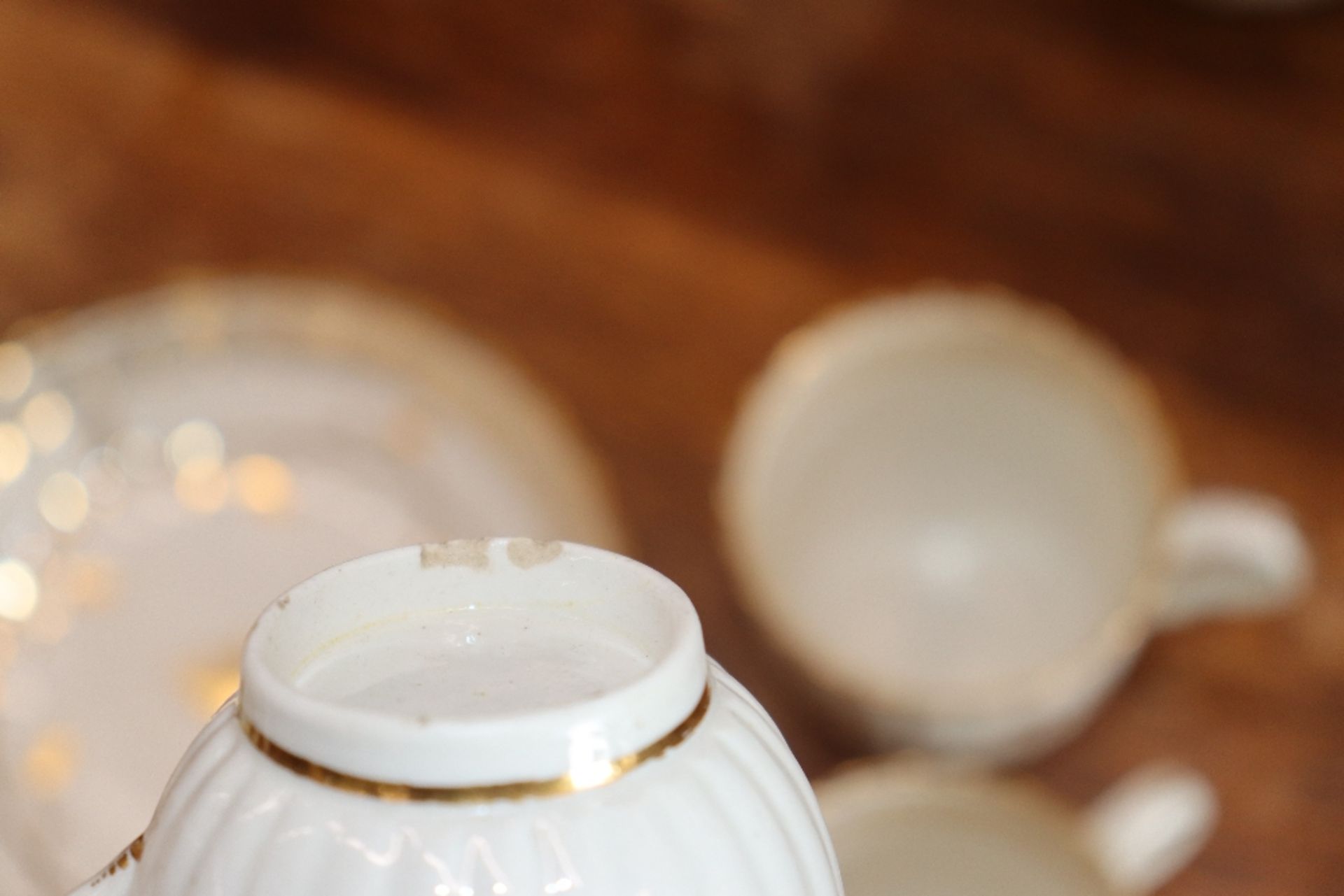 An early 19th Century English porcelain part tea set, of fluted design comprising numerous cups, - Image 6 of 32