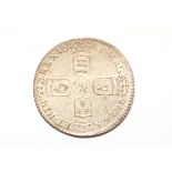 A William III sixpence (date worn)