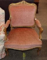 A 19th Century French gilt wood armchair with pink