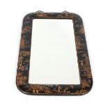 An Oriental black lacquer wall mirror, with chinoiserie decoration, 108cm x 61cm