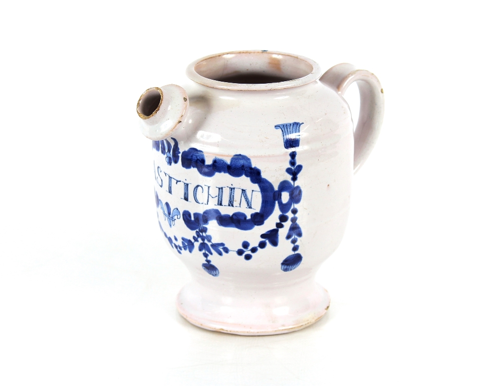 A fine London Delft wet drug jar, decorated in blue, the scrollwork panel inscribed "O:Mastichin"