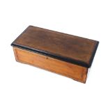 A Swiss rosewood and inlaid cased music box, plating eight airs, 49cm