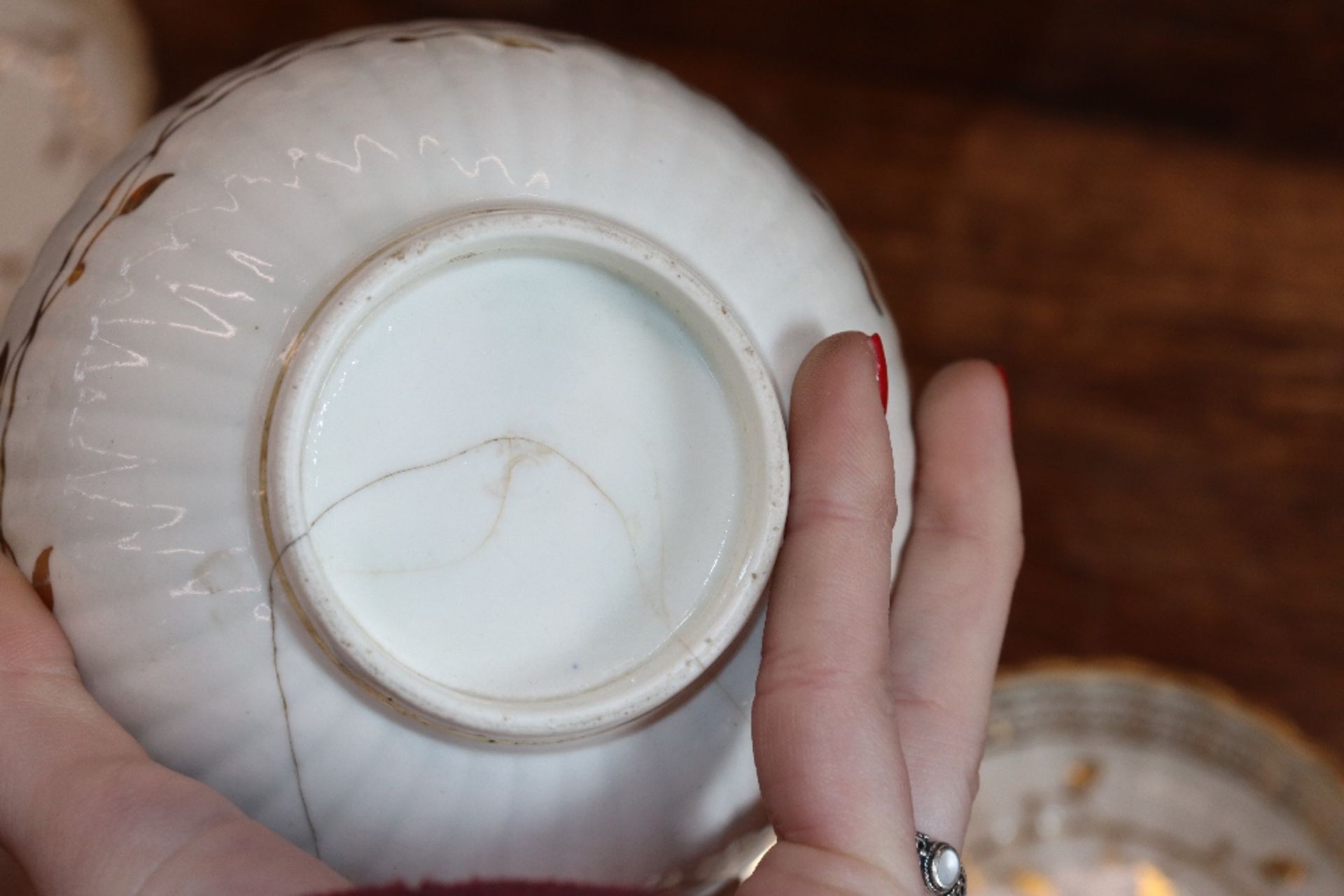 An early 19th Century English porcelain part tea set, of fluted design comprising numerous cups, - Image 17 of 32