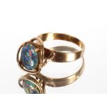 A 9ct gold opal set dress ring with pierced claw mount, 3.8gms