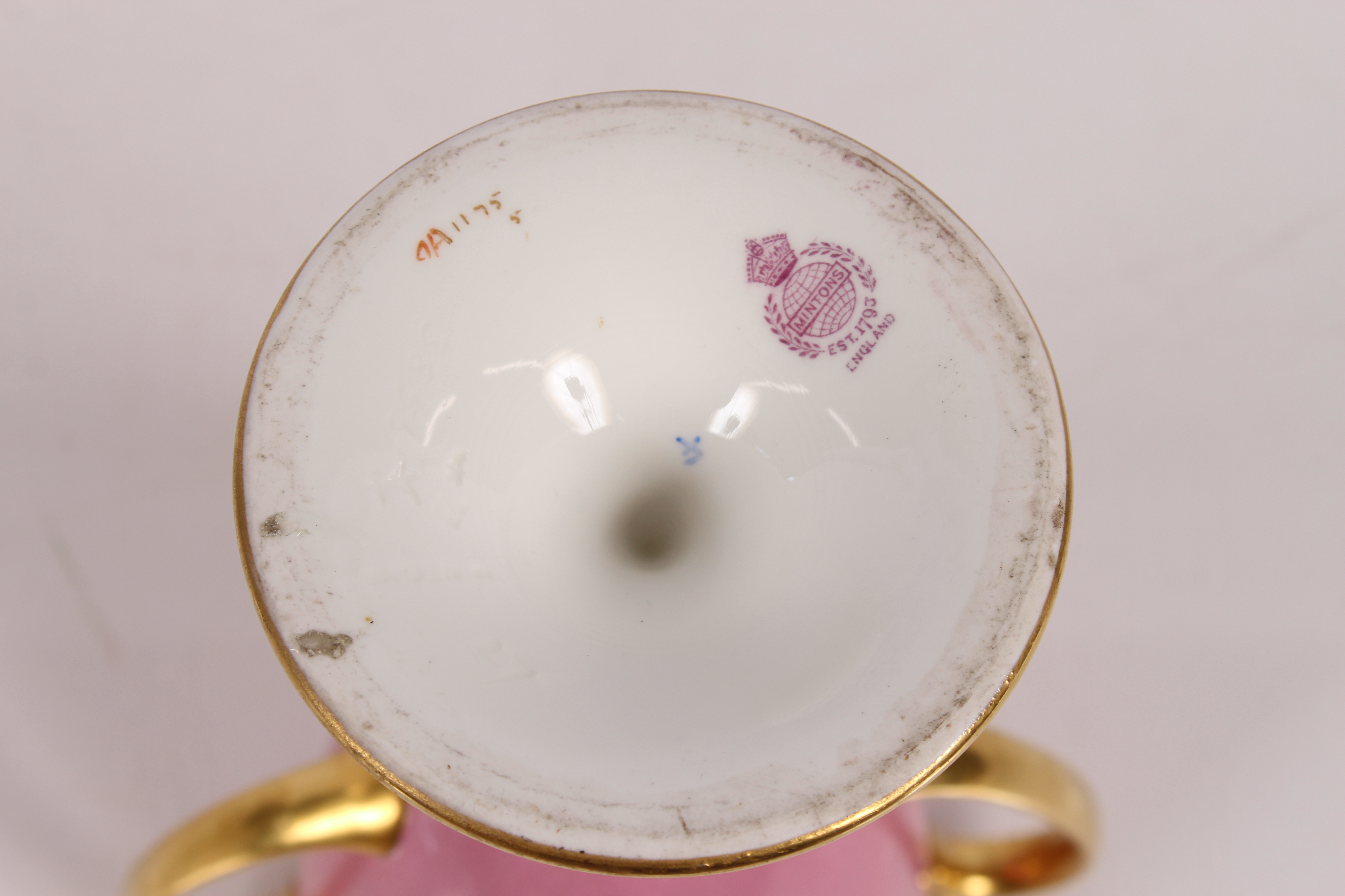 A 19th Century Minton's baluster cup, decorated with a finely painted foliate panel flanked by - Image 4 of 4