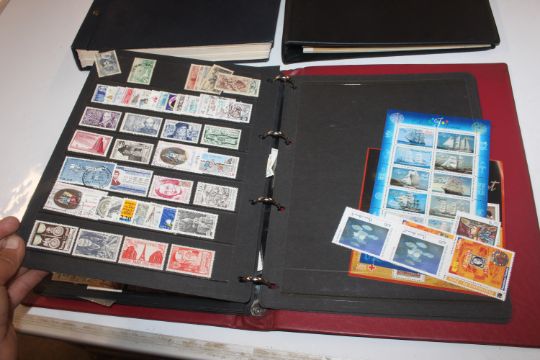 A box containing stamp albums and various contents - Image 24 of 36