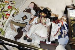 A quantity of dressed dolls