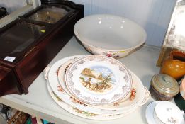 A floral decorated wash bowl and various plates