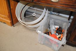 A box of miscellaneous items to include fishing li