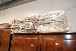 A quantity of floral patterned curtains