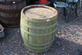 A small coopered wooden barrel