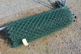 A length of plastic coated chain link fencing (1.2