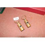 Two brass reproduction Titanic style whistles