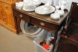 A mahogany bow fronted two drawer hall table