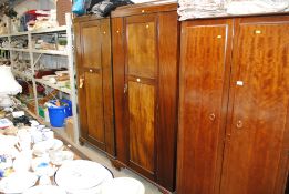 A 1930's mahogany single door wardrobe
