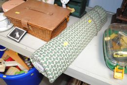 A green patterned roller blind