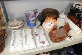 A collection of various pottery to include an egg