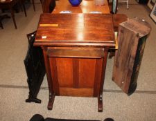An antique oak church lectern, having panelled front, 74cm wide x 106cm high