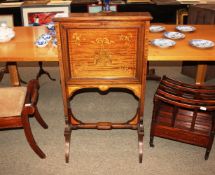 An Edwardian inlaid mahogany ladies writing desk, converting to a fire screen, the interior lined in