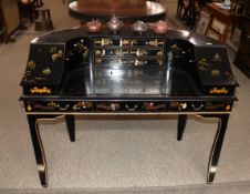 A 20th Century lacquered and chinoiserie decorated Carlton House desk, 133cm wide